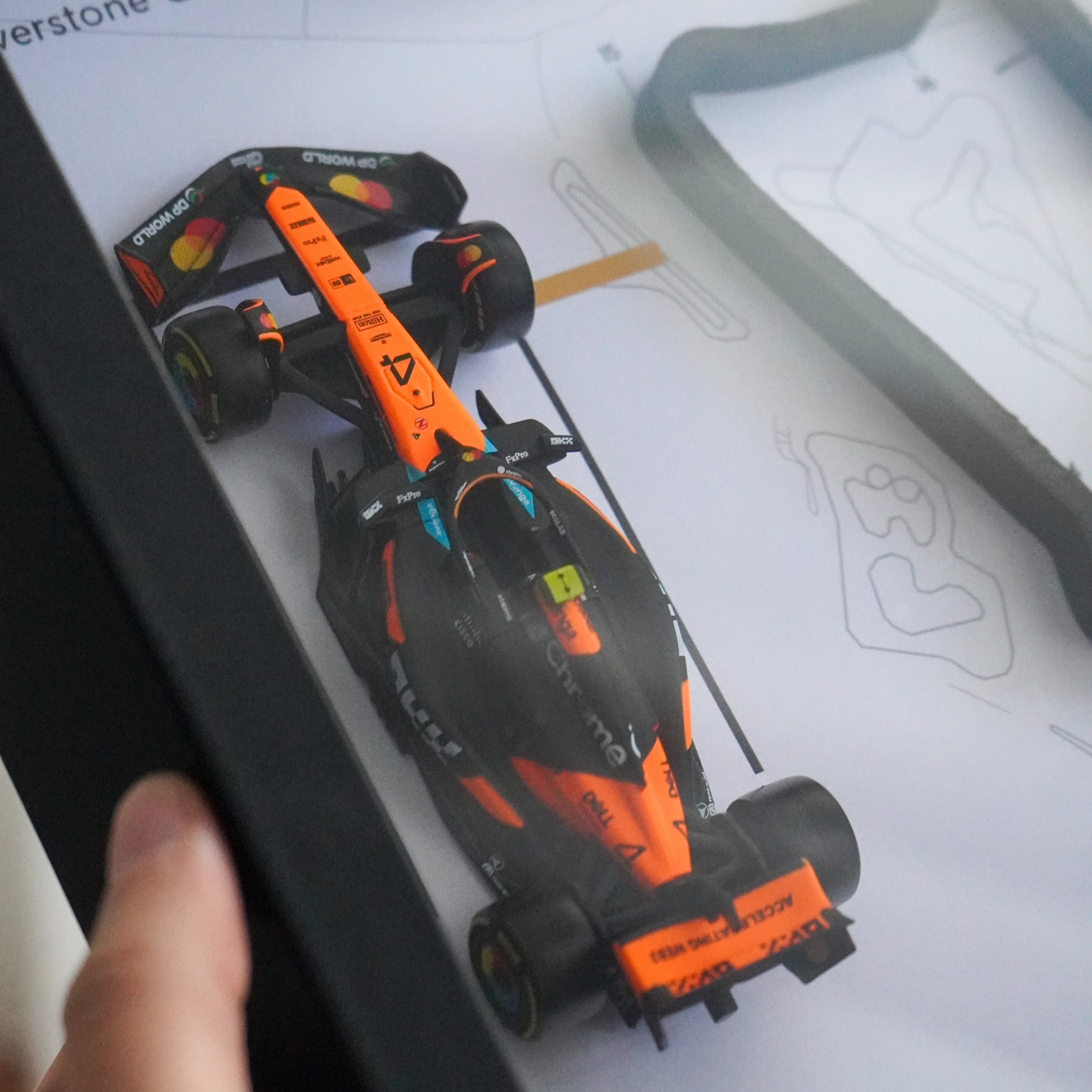 F1 car model on a display with 'British GP' text